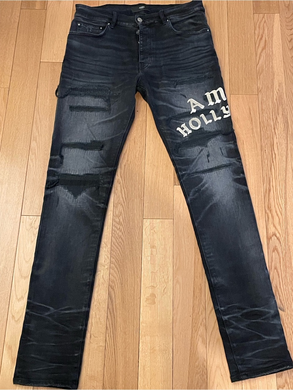 AMIRI Black Skinny Jeans with White Script Graphic